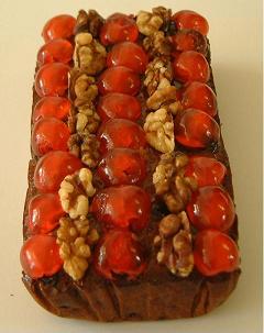 Traditional Rich Fruit Cake Loaf, decorated with walnuts and cherries. One our most popular cakes, a really good 'everyday cake' to keep as its easy to take a single slice and rewrap.